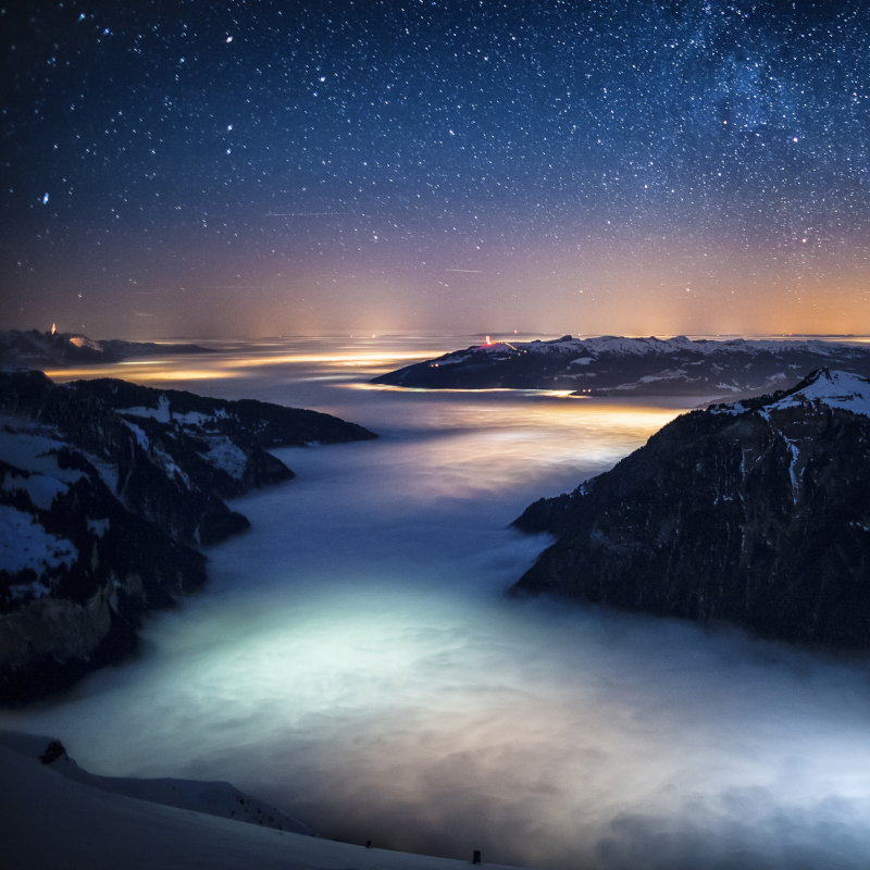 Clouds illuminated by artificial light at night above Lütschinental, Switzerland. © Alessandro Della Bella.