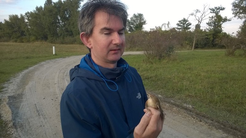 Richard holding a reed warbler