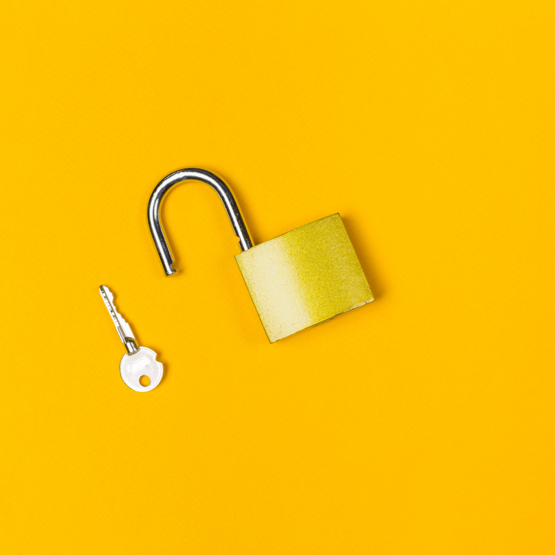 Open padlock and key