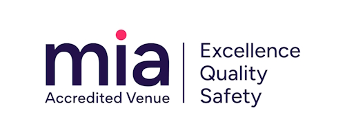 Blue words on white background - Mia accredited venue sticker reads: excellence, quality, safety